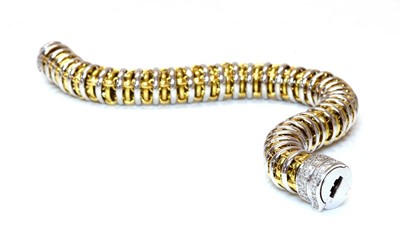 Lot 454 - A two coloured gold diamond set bracelet