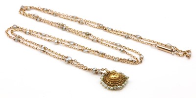 Lot 122 - A late Victorian pearl set long chain