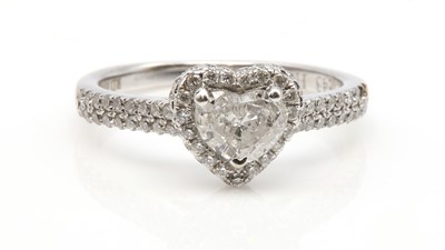 Lot 363 - A white gold heart cut diamond halo cluster ring