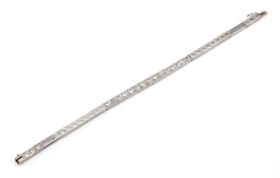Lot 174 - An Art Deco diamond set line bracelet