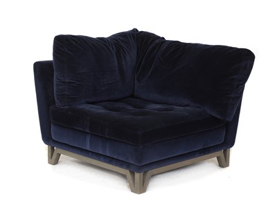 Lot 328 - A Roche Bois blue velvet corner armchair