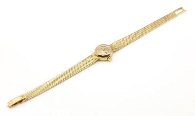 Lot 567 - A ladies' 18ct gold Omega mechanical bracelet watch, c.1960