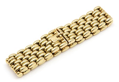 Lot 400 - An 18ct gold seven row panther style bracelet, c.1960