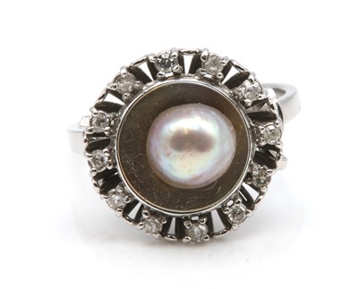 Lot 255 - A Continental cultured pearl and diamond cluster ring