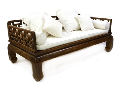 Lot 424 - A modern Asian teak daybed