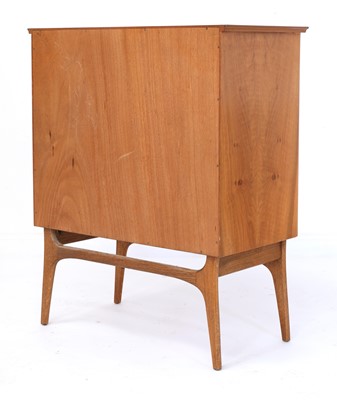 Lot 382 - An Alfred Cox walnut and teak chest of drawers