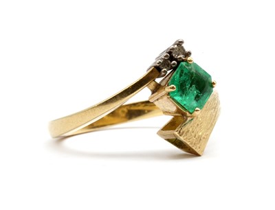 Lot 87 - A gold emerald and diamond ring