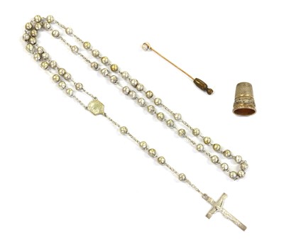 Lot 258 - A gold single stone pearl stick pin