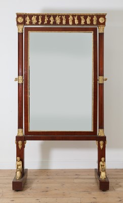 Lot 24 - A French Empire cheval mirror