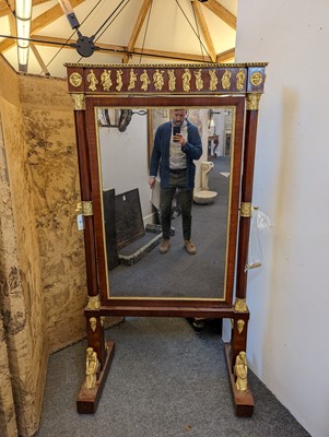 Lot 24 - A French Empire cheval mirror