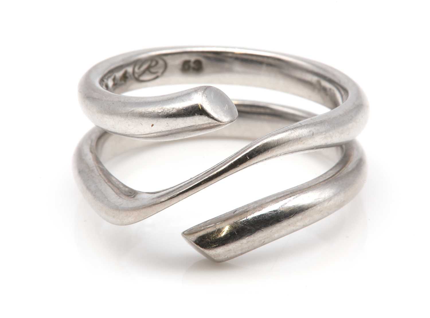 Lot 452 - An 18ct white gold 'Magic' ring, by Georg Jensen