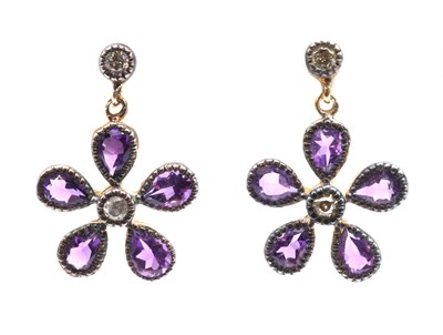 Lot 212 - A pair of silver and gold, amethyst and diamond floral cluster drop earrings