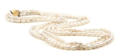 Lot 238 - A three row cultured freshwater pearl necklace