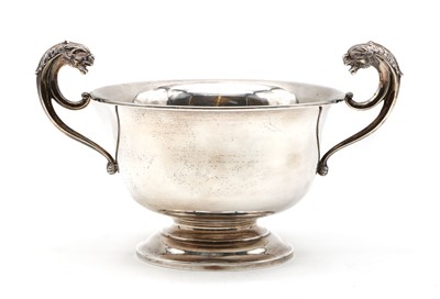 Lot 10 - A silver twin handled pedestal cup