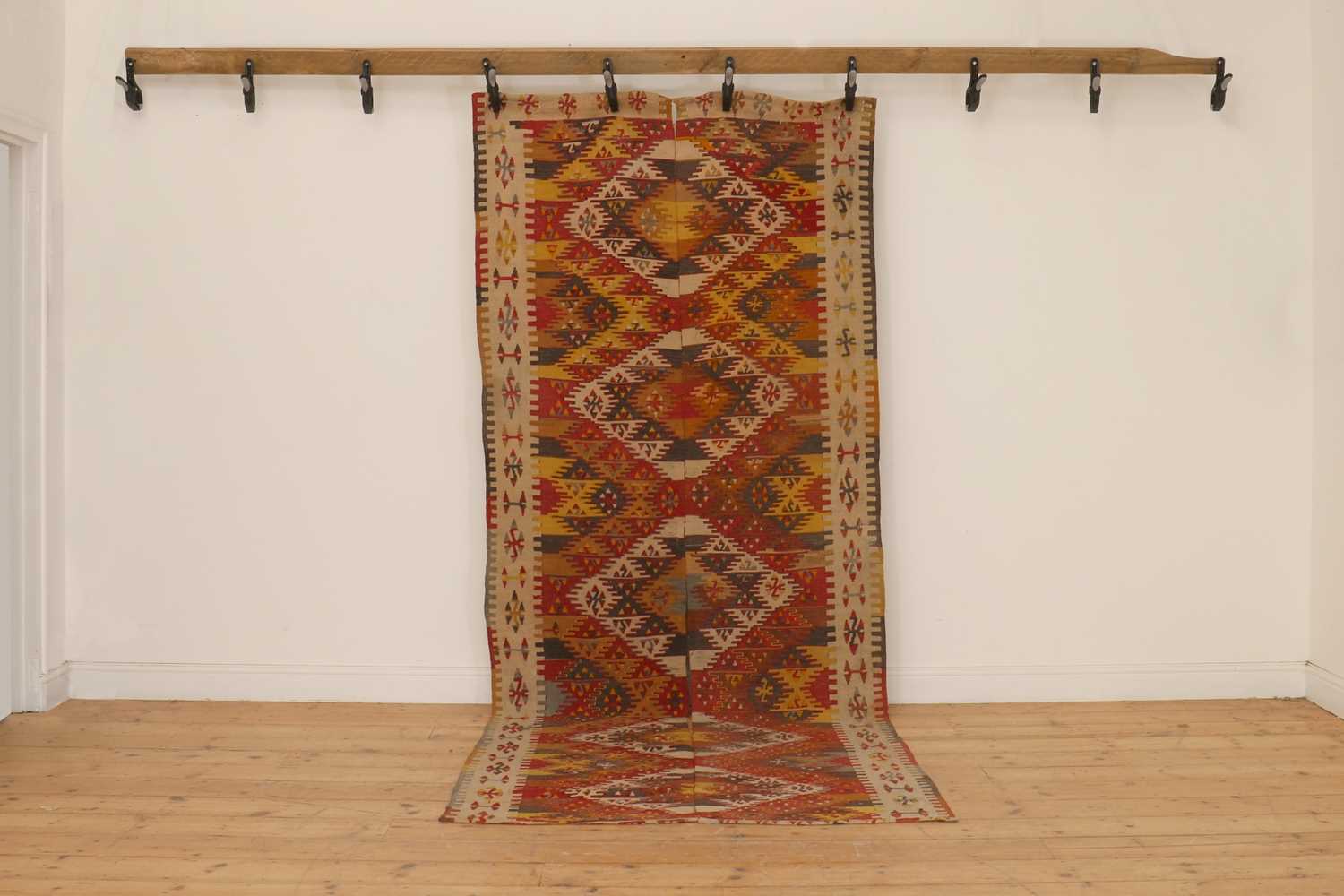 Lot 40 - A kilim flatweave wool rug