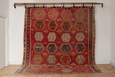 Lot 44 - A large kilim flatweave wool rug