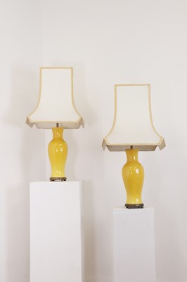 Lot 20 - A pair of Chinese-style yellow porcelain table lamps