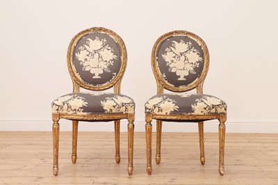 Lot 460 - A pair of Louis XVI-style giltwood fauteuils