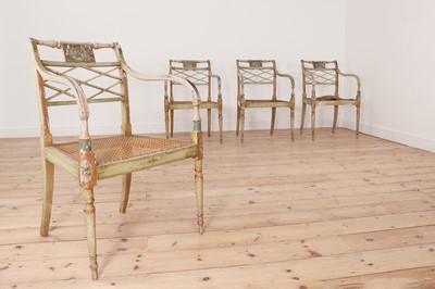 Lot 209 - A set of four George III painted elbow chairs