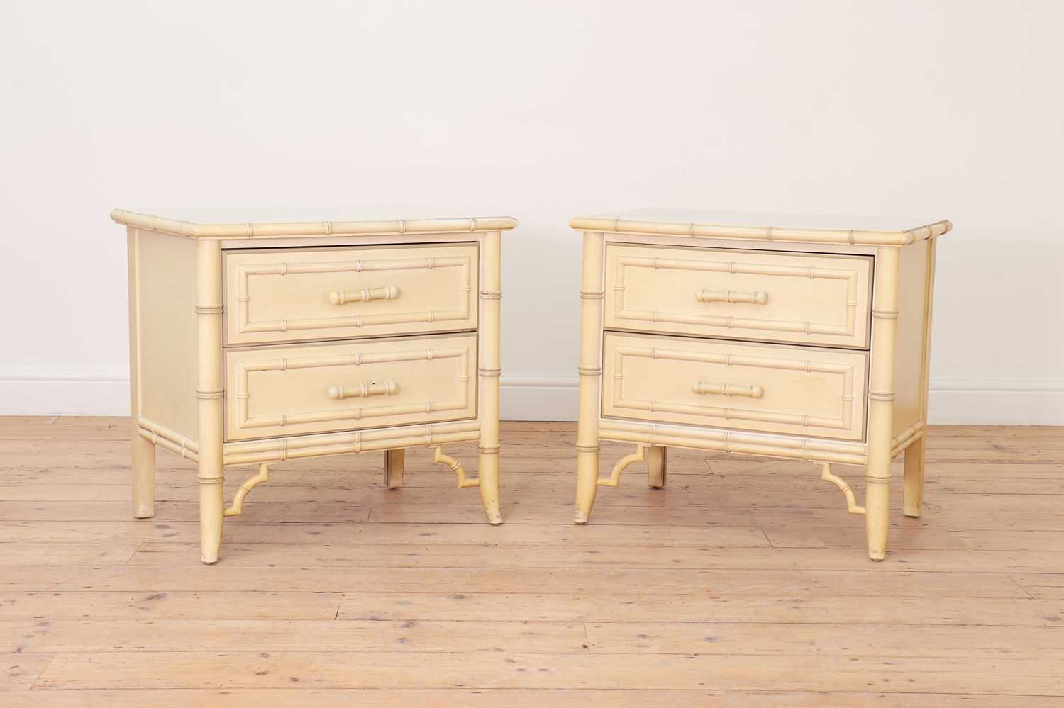 Lot 19 - A pair of painted faux bamboo bedside tables
