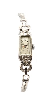 Lot 289 - A platinum diamond set mechanical cocktail watch