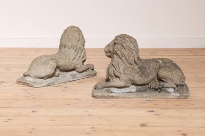 Lot 52 - A pair of reconstituted stone recumbent lions