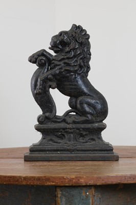 Lot 51 - A cast iron doorstop as an heraldic lion