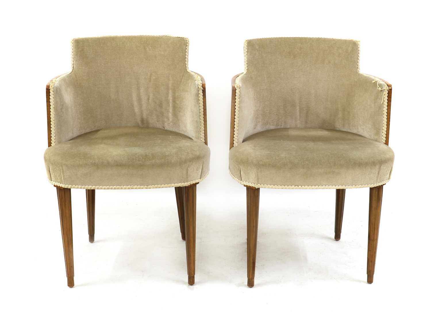 Lot 135 - A pair of Art Deco walnut armchairs