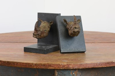 Lot 62 - A pair of bronze bookends