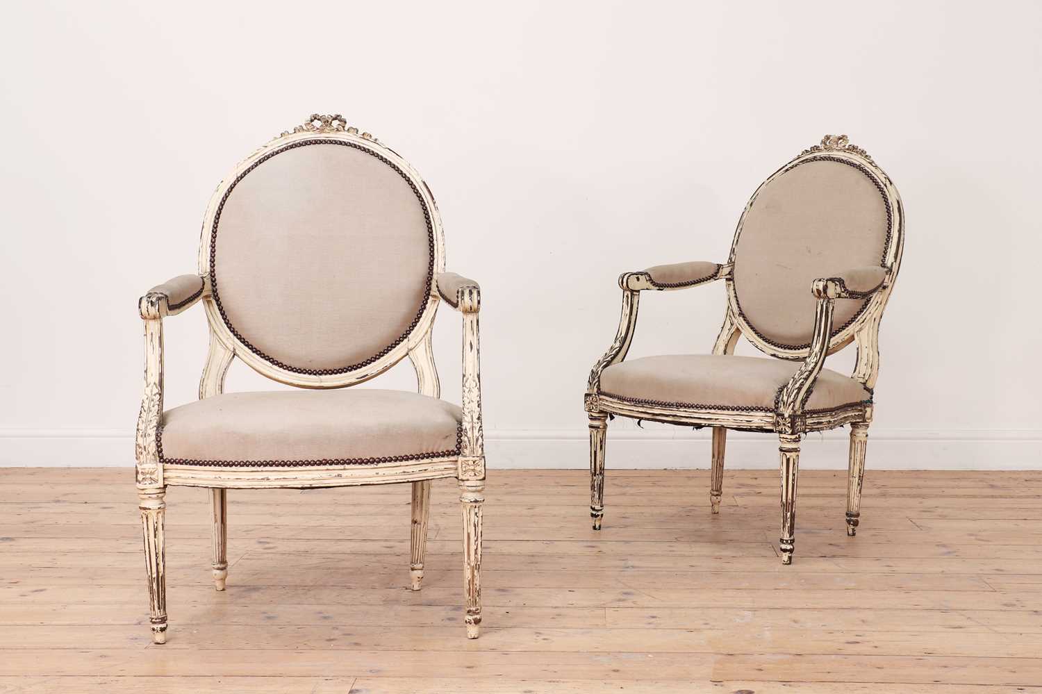 Lot 413 - A pair of Louis XVI white-painted fauteuil