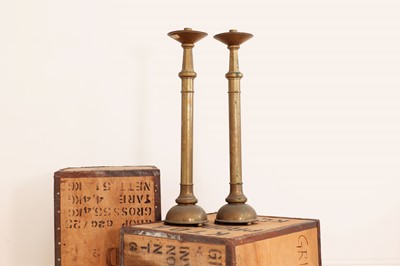 Lot 446 - A pair of brass altar candlesticks