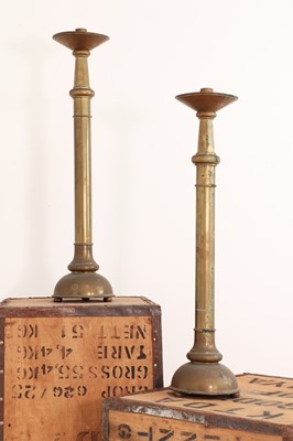Lot 446 - A pair of brass altar candlesticks