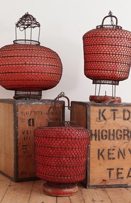 Lot 424 - A Chinese wirework and red paper globe lantern