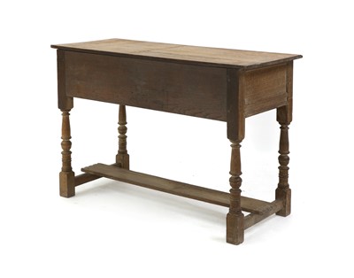 Lot 38 - A limed oak side table