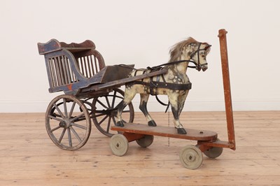 Lot 316A - A wooden and painted children's pull along pony and trap