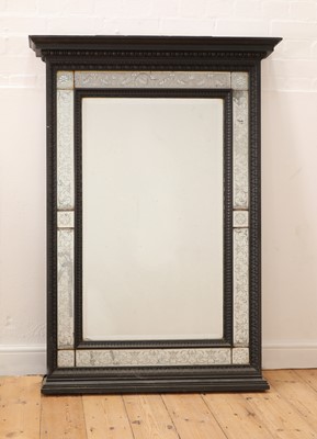 Lot 531 - A large ebonised pier mirror