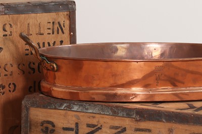 Lot 454 - An oval copper pan