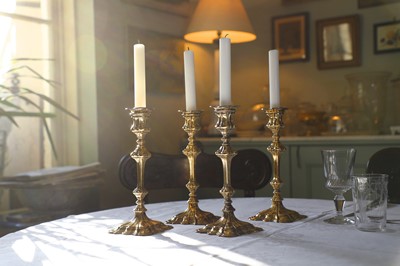 Lot 122 - A set of four Elkington & Co. candlesticks
