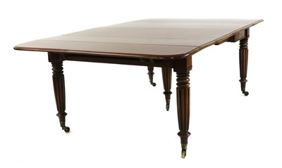 Lot 224 - A mahogany drop flap extending dining table