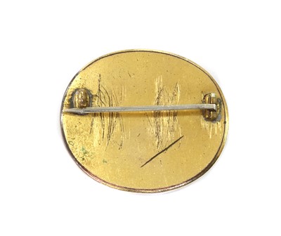Lot 1 - A Georgian gilt metal plaque brooch