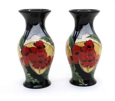 Lot 204 - A pair of Moorcroft pottery ‘Forever England’ pattern vases