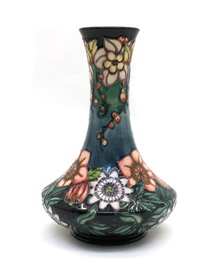 Lot 215 - A Moorcroft pottery ‘Carousel’ pattern vase