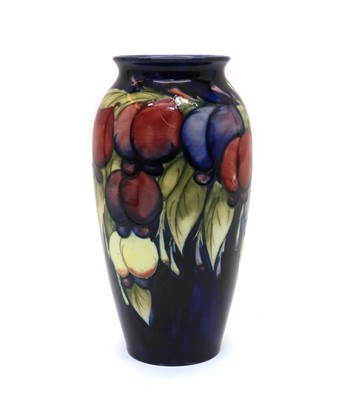 Lot 216 - A William Moorcroft pottery ‘Wisteria’ pattern vase