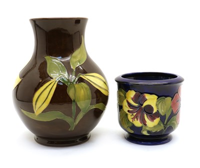 Lot 213 - A Moorcroft pottery ‘Hibiscus’ pattern jardinière