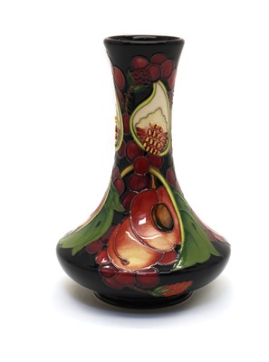 Lot 205 - A Moorcroft pottery ‘Queens Choice’ pattern vase