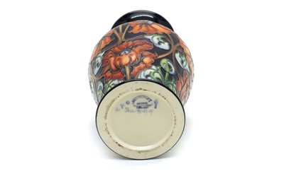 Lot 201 - A Moorcroft pottery ‘Tapestry of Colour’ pattern trial vase