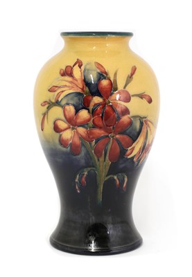 Lot 89 - A William Moorcroft ‘Freesia’ pattern vase