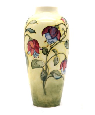 Lot 202 - A Walter Moorcroft ‘Fuchsia’ pattern vase