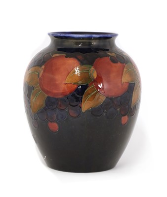 Lot 86 - A William Moorcroft pottery ‘Pomegranate’ pattern vase