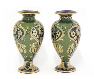 Lot 84 - A pair of James Macintyre & Co. pottery Florian Ware vases